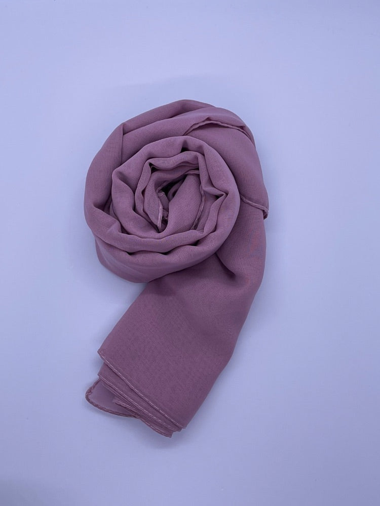 mauve Essential Chiffon Hijab with a semi-transparent design, secured with stylish pins, ideal for all-day comfort and versatile wear