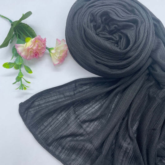 Kuwaiti Lulua Open Knit Cotton Hijab in a lightweight, breathable, and non-slip design. Soft and stretchy fabric with an airy, sheer texture, perfect for warm weather or layering. Drapes beautifully with a subtle open-knit pattern.