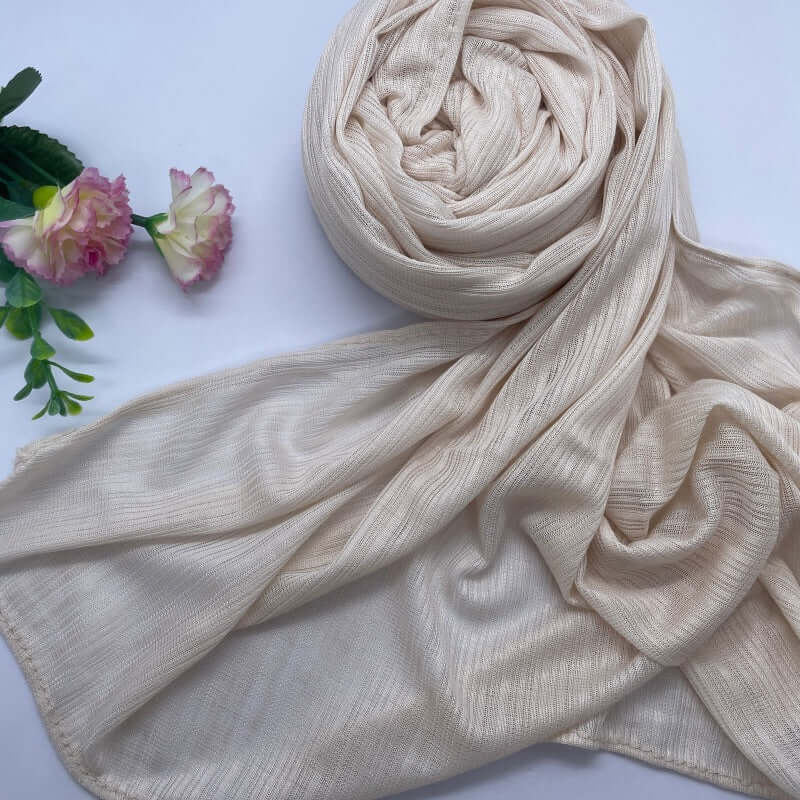 Kuwaiti Lulua Open Knit Cotton Hijab in a lightweight, breathable, and non-slip design. Soft and stretchy fabric with an airy, sheer texture, perfect for warm weather or layering. Drapes beautifully with a subtle open-knit pattern.