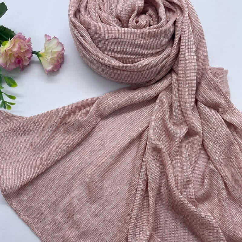 Kuwaiti Lulua Open Knit Cotton Hijab in a lightweight, breathable, and non-slip design. Soft and stretchy fabric with an airy, sheer texture, perfect for warm weather or layering. Drapes beautifully with a subtle open-knit pattern.