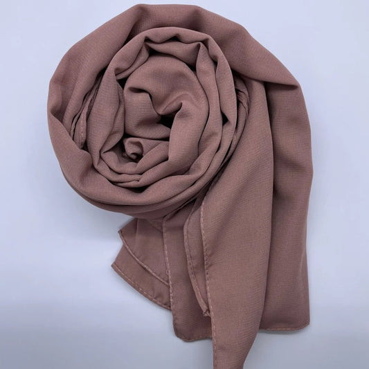 Premium Medina Silk brown Georgette  hijab with soft matte finish, lightweight breathable design, and full coverage, ideal for modest fashion and everyday wear.