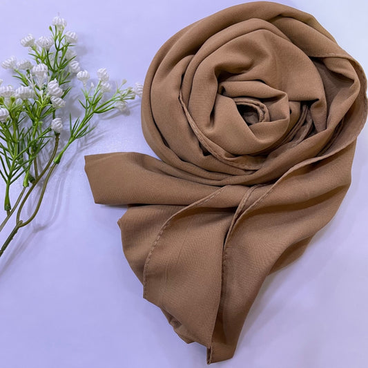 Premium Medina Silk brown Georgette  hijab with soft matte finish, lightweight breathable design, and full coverage, ideal for modest fashion and everyday wear.
