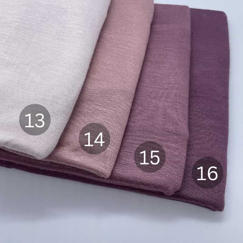 Instant Double Stretch Jersey Kuwaiti Hijab in vibrant color, pre-sewn for easy slip-on. Made from soft, non-slip, breathable fabric with 4-way stretch for all-day comfort. Ideal for busy women or new hijabis seeking ready-to-wear, hassle-free styling