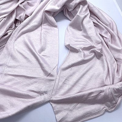 Instant Double Stretch Jersey Kuwaiti Hijab in vibrant color, pre-sewn for easy slip-on. Made from soft, non-slip, breathable fabric with 4-way stretch for all-day comfort. Ideal for busy women or new hijabis seeking ready-to-wear, hassle-free styling