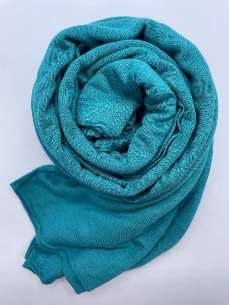 Dark turquoise Breathable cotton hijab with a matte sheen and textured finish, perfect for everyday wear and layering