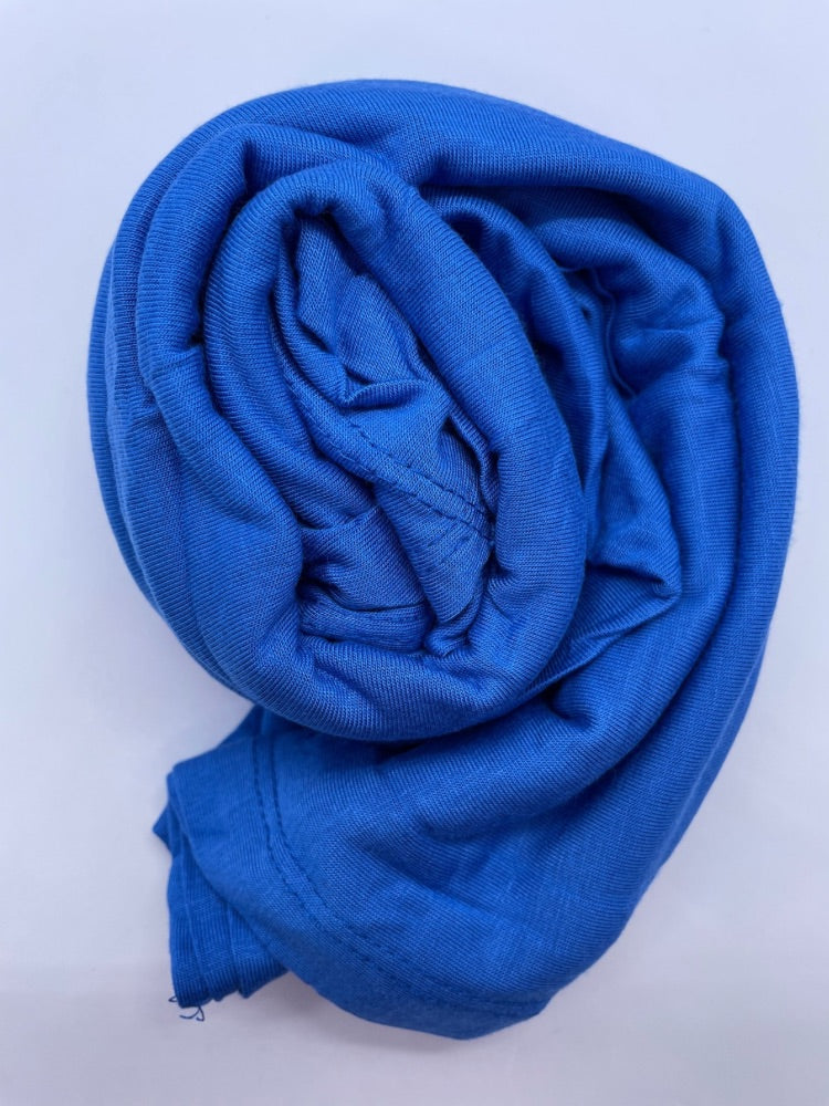 indigo blue Breathable cotton hijab with a matte sheen and textured finish, perfect for everyday wear and layering.