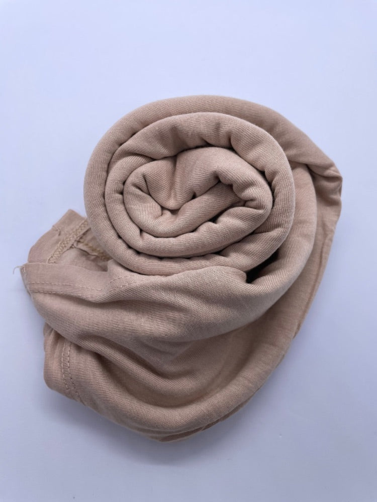 Nude brown Breathable cotton hijab with a matte sheen and textured finish, perfect for everyday wear and layering.