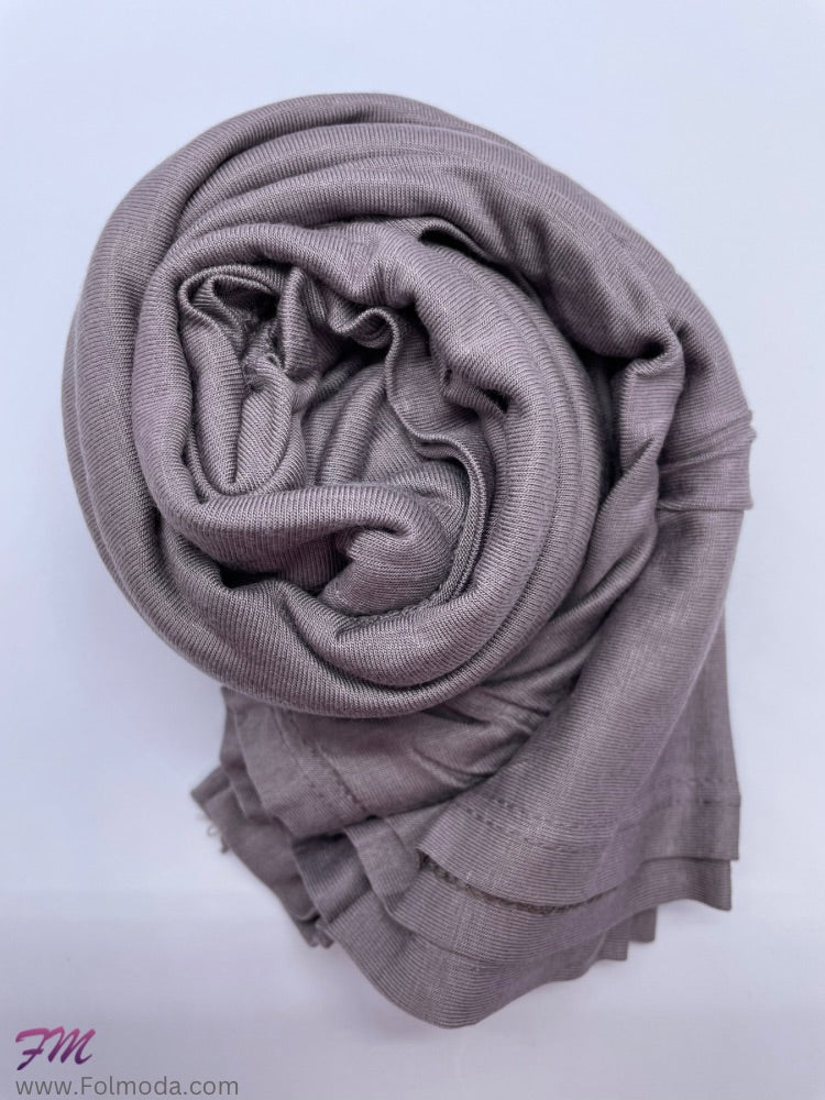 Taupe grayBreathable cotton hijab with a matte sheen and textured finish, perfect for everyday wear and layering