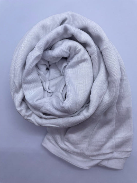 White Breathable cotton hijab with a matte sheen and textured finish, perfect for everyday wear and layering