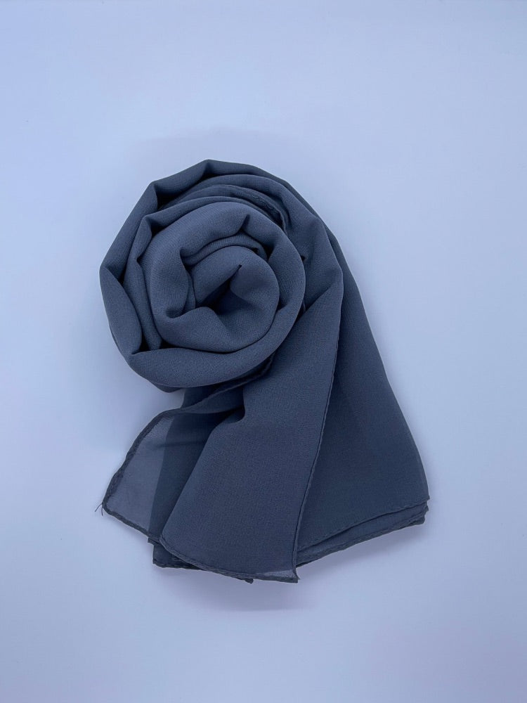 Blue gray Essential Chiffon Hijab with a semi-transparent design, secured with stylish pins, ideal for all-day comfort and versatile wear