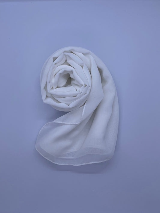 ivory Essential Chiffon Hijab with a semi-transparent design, secured with stylish pins, ideal for all-day comfort and versatile wear