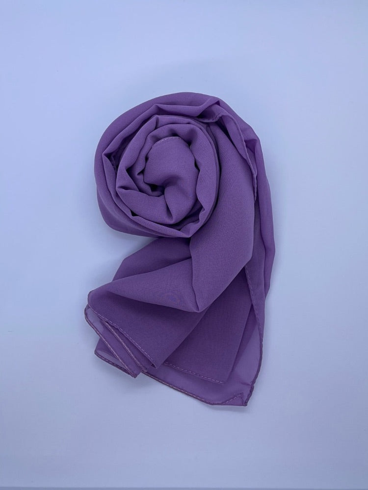 Bright Lavender Essential Chiffon Hijab with a semi-transparent design, secured with stylish pins, ideal for all-day comfort and versatile wear