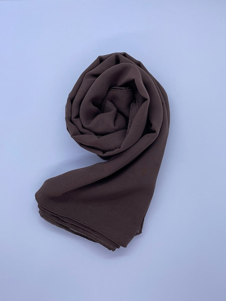 brown coffee Essential Chiffon Hijab with a semi-transparent design, secured with stylish pins, ideal for all-day comfort and versatile wear