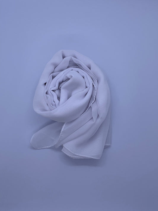 White  Essential Chiffon Hijab with a semi-transparent design, secured with stylish pins, ideal for all-day comfort and versatile wear