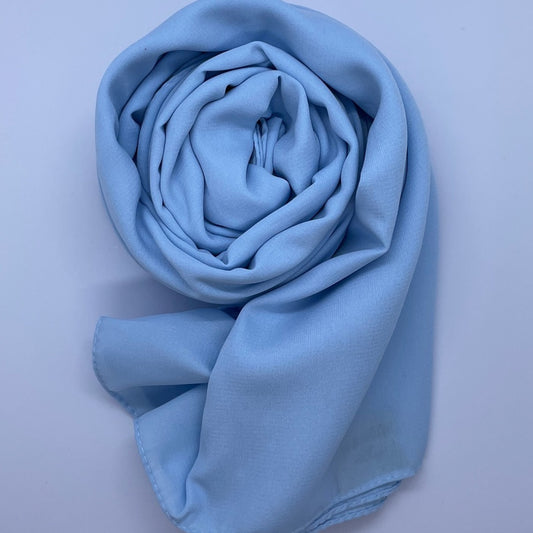 Premium Medina Silk baby blue Hijab with soft matte finish, lightweight breathable design, and full coverage, ideal for modest fashion and everyday wear.