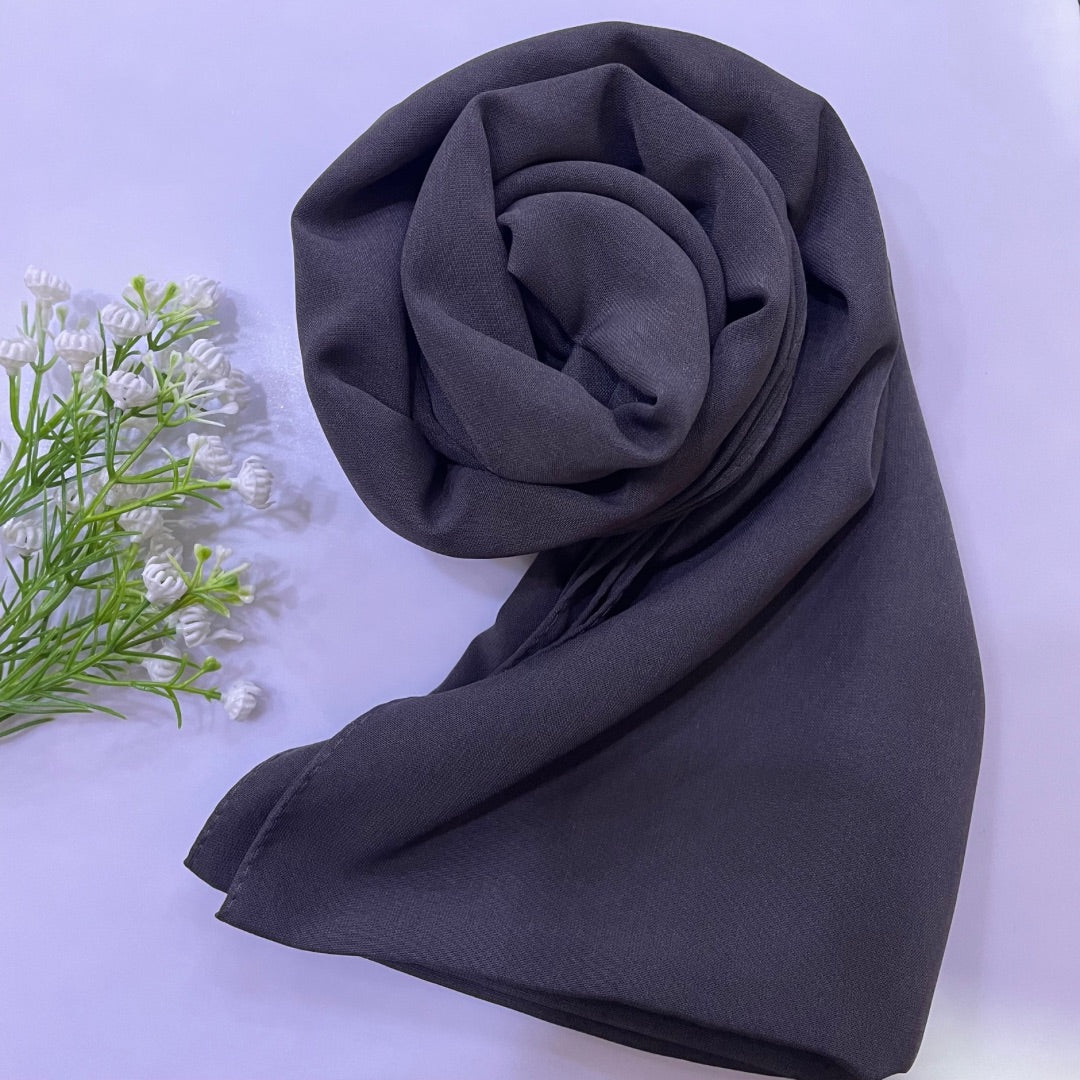 Premium Medina Silk dark gray Hijab with soft matte finish, lightweight breathable design, and full coverage, ideal for modest fashion and everyday wear.